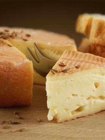 Traditional Munster cheese with cumin